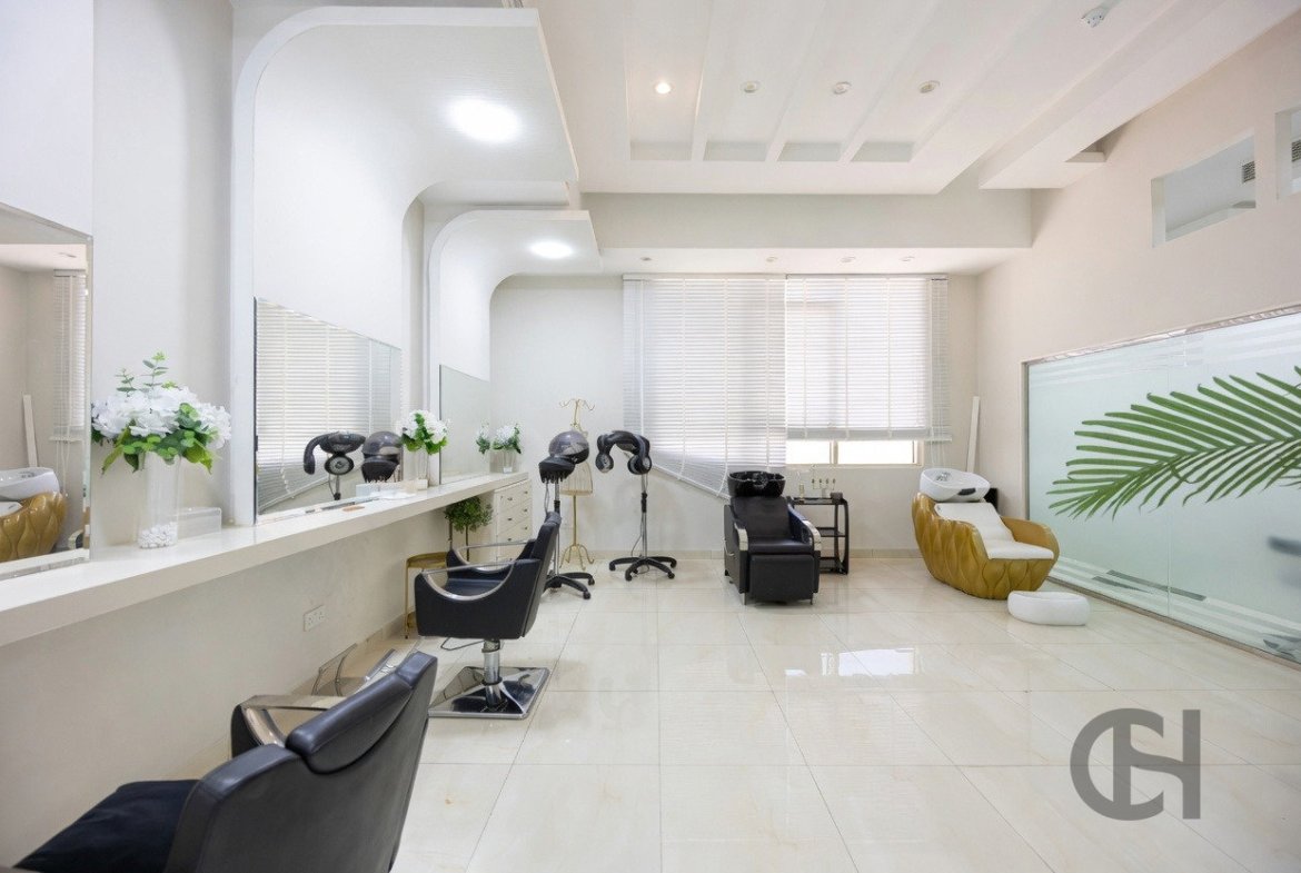 12BR commercial villa for sale in Khalifa City, Abu Dhabi with prime main road visibility, premium finishing and flexible business-use potential.