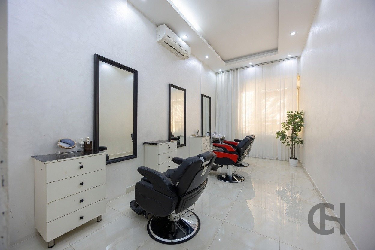 12BR commercial villa for sale in Khalifa City, Abu Dhabi with prime main road visibility, premium finishing and flexible business-use potential.