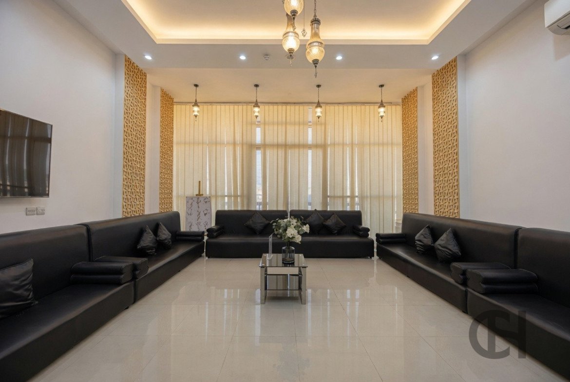 12BR commercial villa for sale in Khalifa City, Abu Dhabi with prime main road visibility, premium finishing and flexible business-use potential.