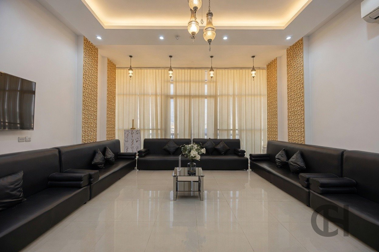 12BR commercial villa for sale in Khalifa City, Abu Dhabi with prime main road visibility, premium finishing and flexible business-use potential.