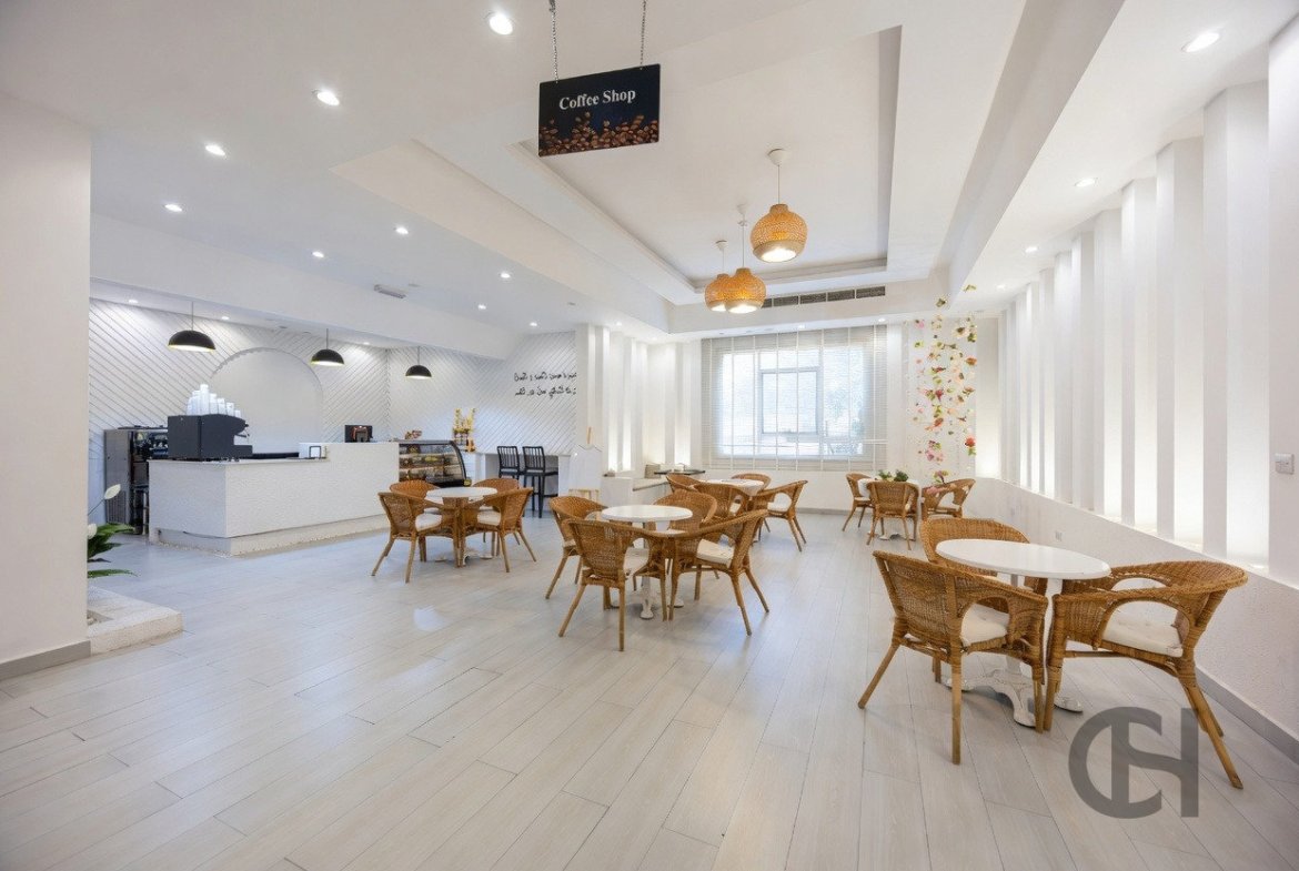 12BR commercial villa for sale in Khalifa City, Abu Dhabi with prime main road visibility, premium finishing and flexible business-use potential.