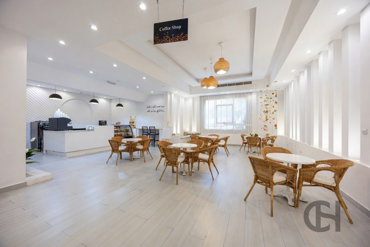 12BR commercial villa for sale in Khalifa City, Abu Dhabi with prime main road visibility, premium finishing and flexible business-use potential.