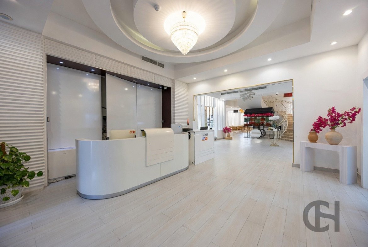 12BR commercial villa for sale in Khalifa City, Abu Dhabi with prime main road visibility, premium finishing and flexible business-use potential.