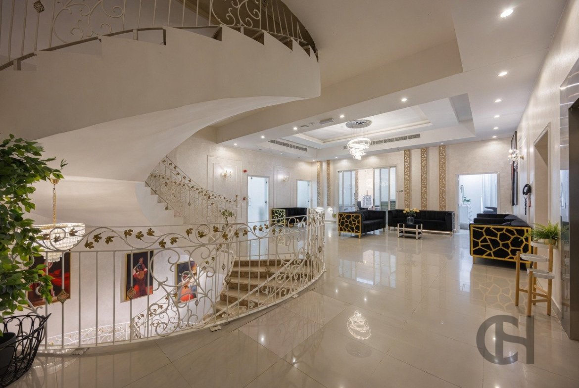 12BR commercial villa for sale in Khalifa City, Abu Dhabi with prime main road visibility, premium finishing and flexible business-use potential.