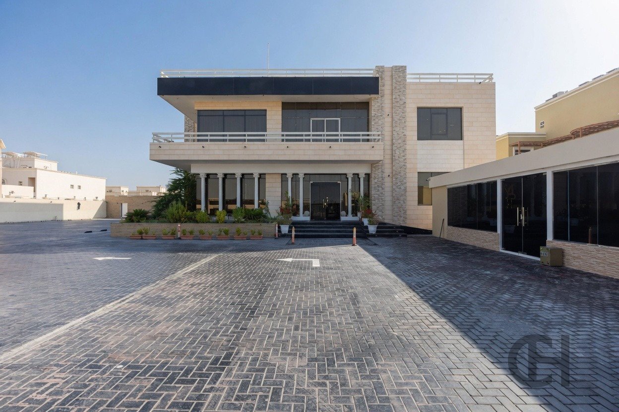 12BR commercial villa for sale in Khalifa City, Abu Dhabi with prime main road visibility, premium finishing and flexible business-use potential.