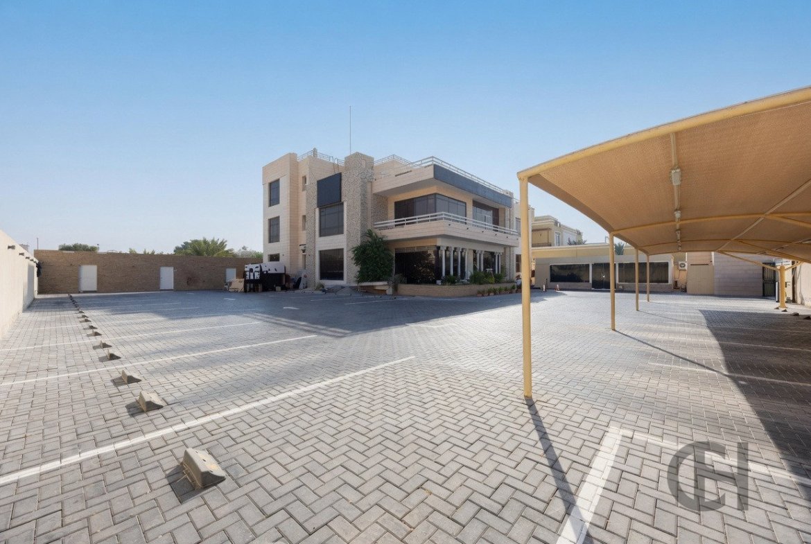 12BR commercial villa for sale in Khalifa City, Abu Dhabi with prime main road visibility, premium finishing and flexible business-use potential.