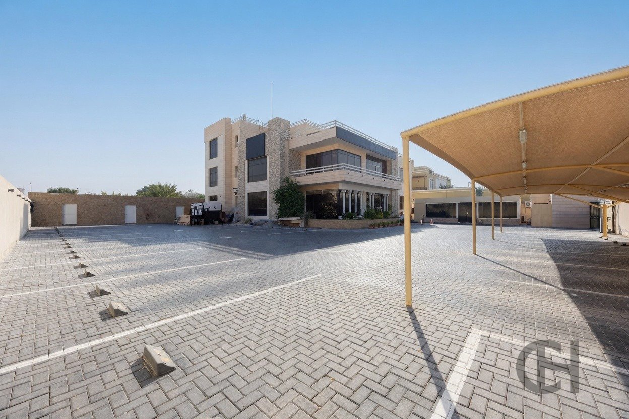12BR commercial villa for sale in Khalifa City, Abu Dhabi with prime main road visibility, premium finishing and flexible business-use potential.